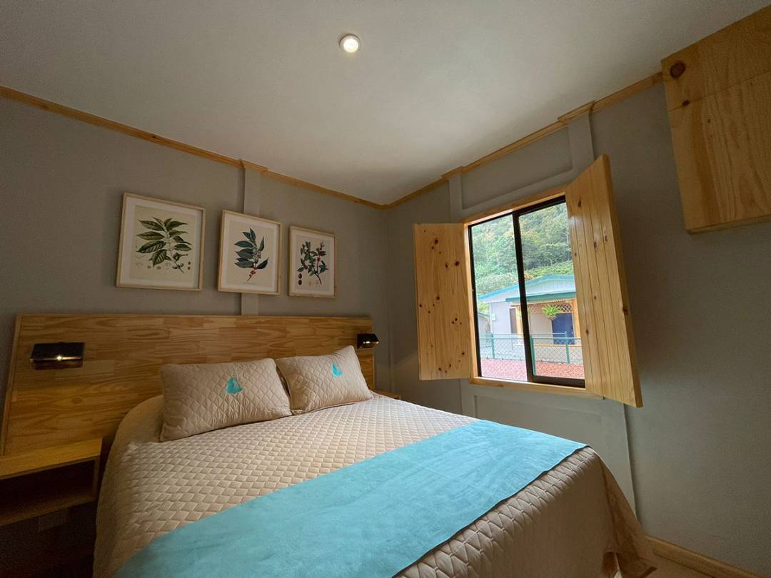 A cozy bedroom featuring a single bed, set in the tranquil ambiance.